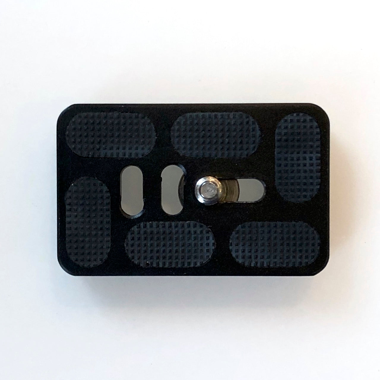 Arca-style quick release plates