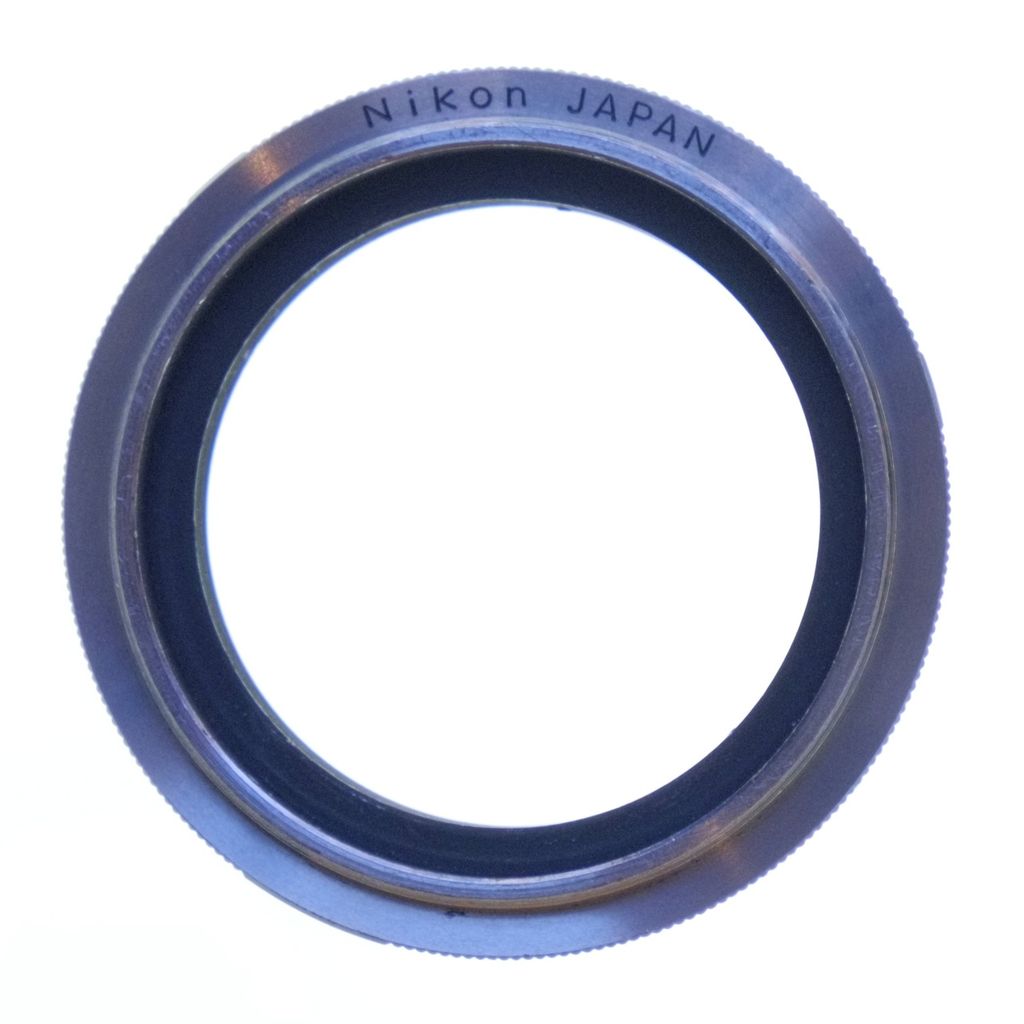 Nikon BR-2 reversing ring with 52mm thread.