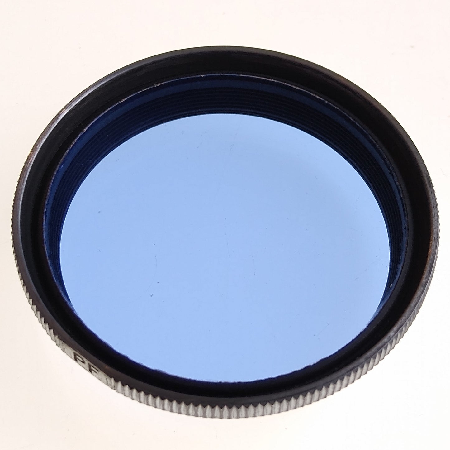 E. Leitz NY FIFLO Photoflood (Blue) filter.